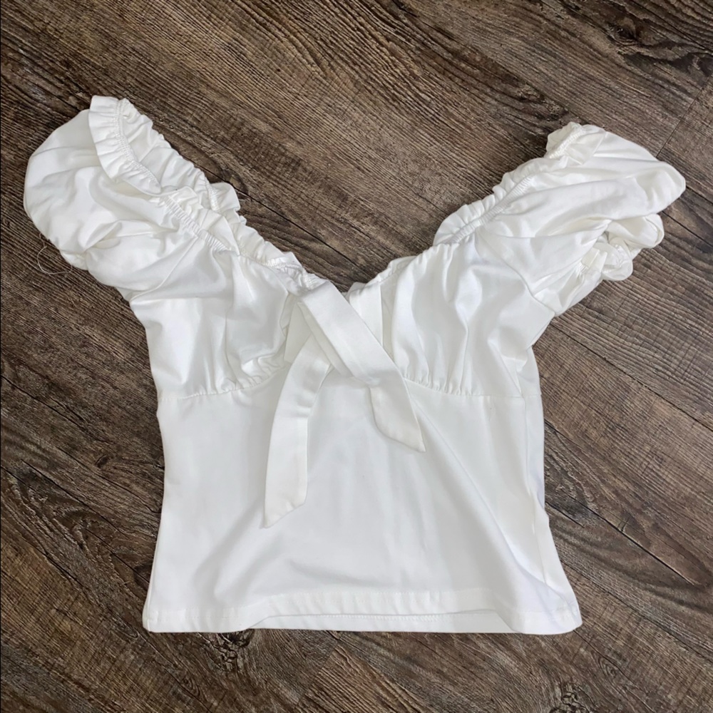 White top knot on the front